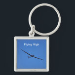Flying high in the sky key ring<br><div class="desc">Gliding to freedom, soaring to new heights.</div>