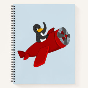 Flying penguin cartoon notebook