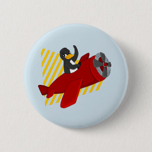 Flying penguing cartoon button