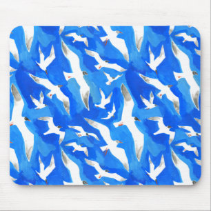 Flying seagulls on sky blue mouse mat