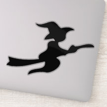 flying witch on broomstick silhouette