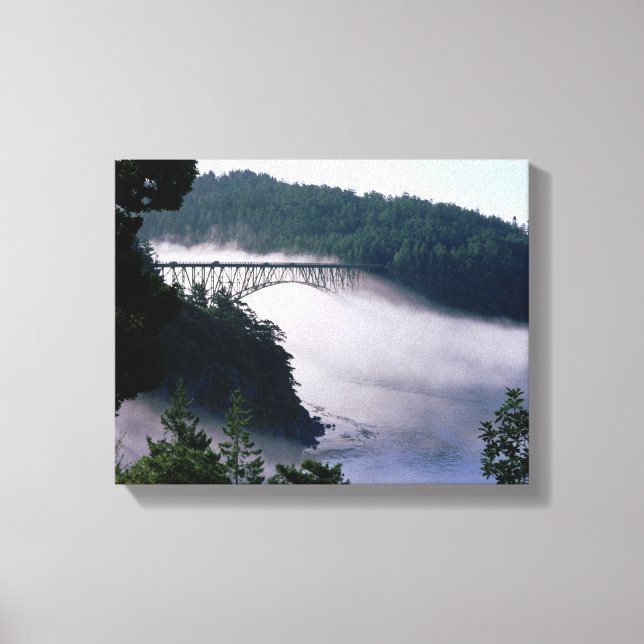Fog drifts under the Deception Pass bridge at Canvas Print (Front)
