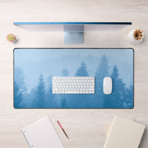 Fog over forest desk mat