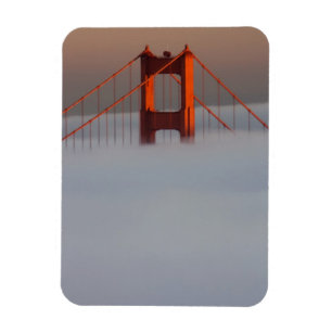 Fog rolls through the San Francisco bay covering 2 Magnet