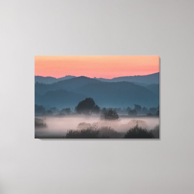 Foggy landscape at sunset canvas print (Front)