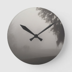 foggy morning waiting on the sun's rise round clock