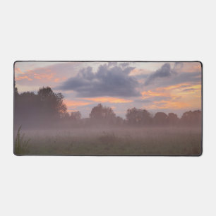 Foggy sunset desk mat