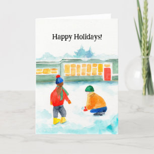 Folded holiday card with children playing in snow