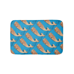 folk art whales on blue bath mat