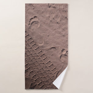 Foot prints in the sand bath towel