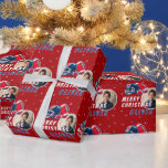 Football Ball Helmet Cartoon Photo Merry Christmas Wrapping Paper<br><div class="desc">Football Ball Helmet Cartoon Photo Merry Christmas Wrapping Paper. Fun and modern football Christmas gift wrap. Featuring a bold cartoon illustration of a football and helmet in red,  navy,  and white. Add your photo and name.</div>