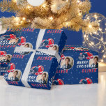 Football Ball Helmet Cartoon Photo Merry Christmas Wrapping Paper<br><div class="desc">Football Ball Helmet Cartoon Photo Merry Christmas Wrapping Paper. Fun and modern football Christmas gift wrap. Featuring a bold cartoon illustration of a football and helmet in red,  navy,  and white. Add your photo and name.</div>