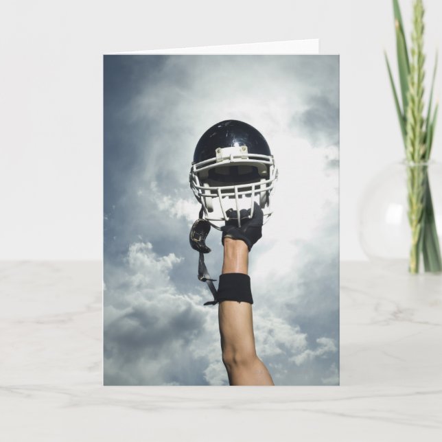 Football player holding helmet in air card (Front)