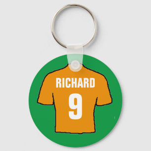 Football shirt design in old gold. key ring