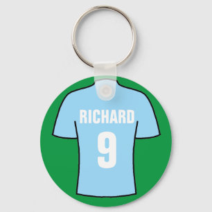 Football shirt design in sky blue. keychain