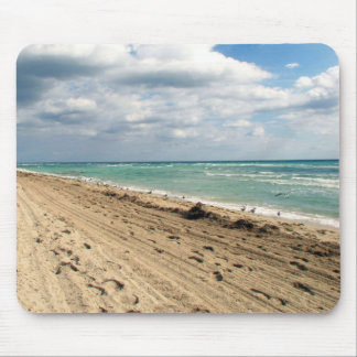 Footprints and ocean mouse mat