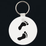 Footprints Key Ring<br><div class="desc">Simple solid black graphic of a pair of human foot prints. Customise and choose your own background colour. Image available on various gifts and products.</div>