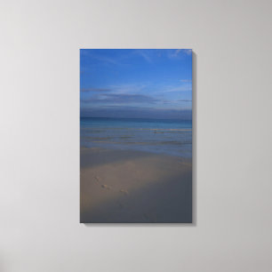 Footprints on beach canvas print
