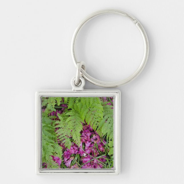 Forest ferns with pink flower petals on ground key ring (Front)