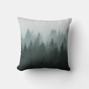 Forest in the morning mist in the mountain. Spruce Cushion