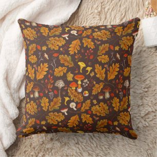 Forest mushrooms and autumn flora on brown cushion