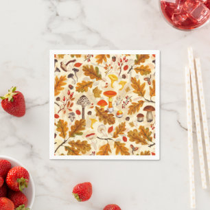 Forest mushrooms and autumn flora on cream napkin