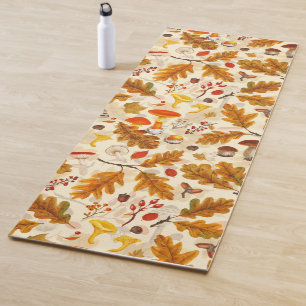 Forest mushrooms and autumn flora on cream yoga mat