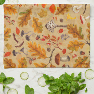 Forest mushrooms and autumn flora on ochre tea towel