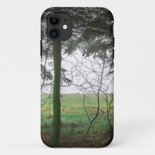 Forest overlooking clearing in the fog iPhone 11 case