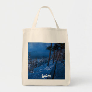 Forest path at winter night tote bag