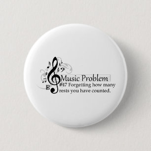 Forgetting how many rests you have counted. 6 cm round badge