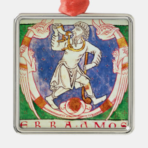 Form of two winged creatures with entwined metal tree decoration