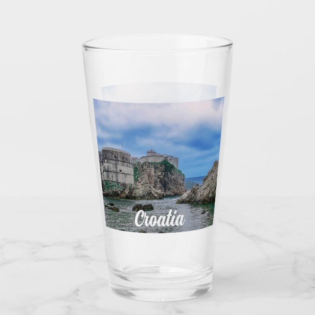 Fortress walls, rocky coast and sea in Croatia Glass (Front)