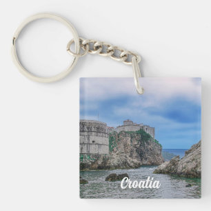 Fortress walls, rocky coast and sea in Croatia Key Ring