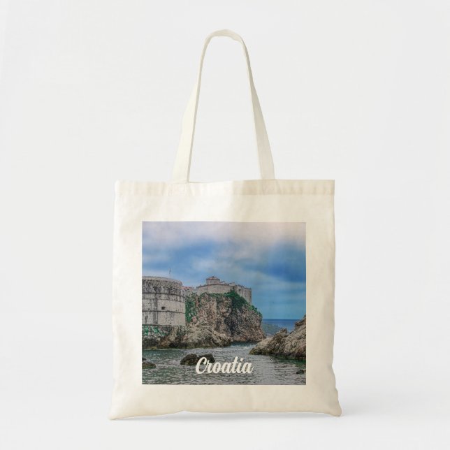 Fortress walls, rocky coast and sea in Croatia Tote Bag (Front)