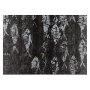 Fossil White Fish on Black Background Cutting Board