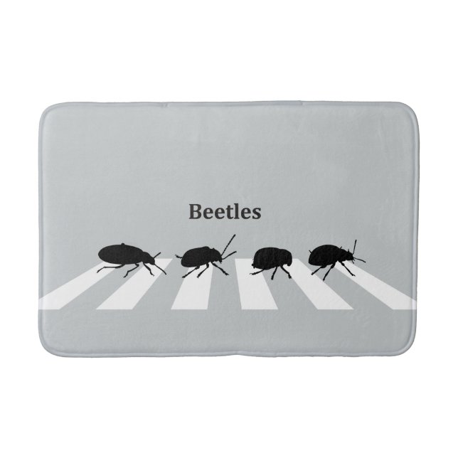 Four beetles walking across a crosswalk in London… Bath Mat (Front)