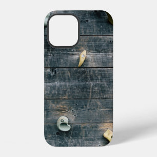 Four brown wooden wall decors iPhone 12 case