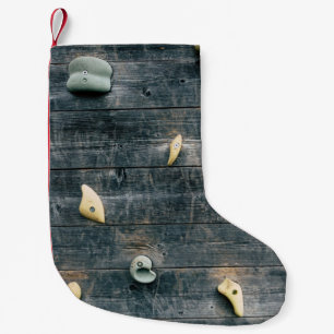 Four brown wooden wall decors small christmas stocking