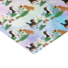 Four Cavalier Spaniels in a Field of Flowers