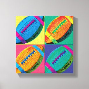 Four Footballs in Different Colours Canvas Print