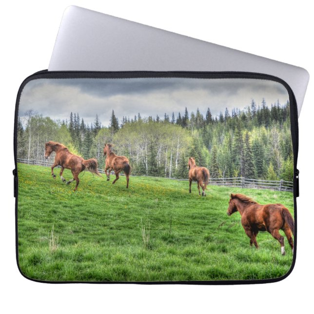 Four Horses Running on Fresh Grass in a Paddock Laptop Sleeve (Front)
