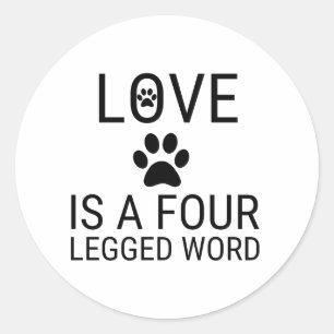 FOUR LEGGED WORD PAW PRINT IS LOVE CLASSIC ROUND STICKER