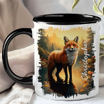 Fox in Autumn Forest Reflection Mug<br><div class="desc">Enjoy the serene beauty of nature with the Fox in Autumn Forest Reflection Mug. This captivating mug features a striking image of a fox standing by a tranquil forest lake during autumn, with the warm colours of fall and the peaceful landscape beautifully reflected in the water. Customised with your name,...</div>