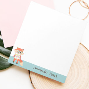 Fox reading notepad