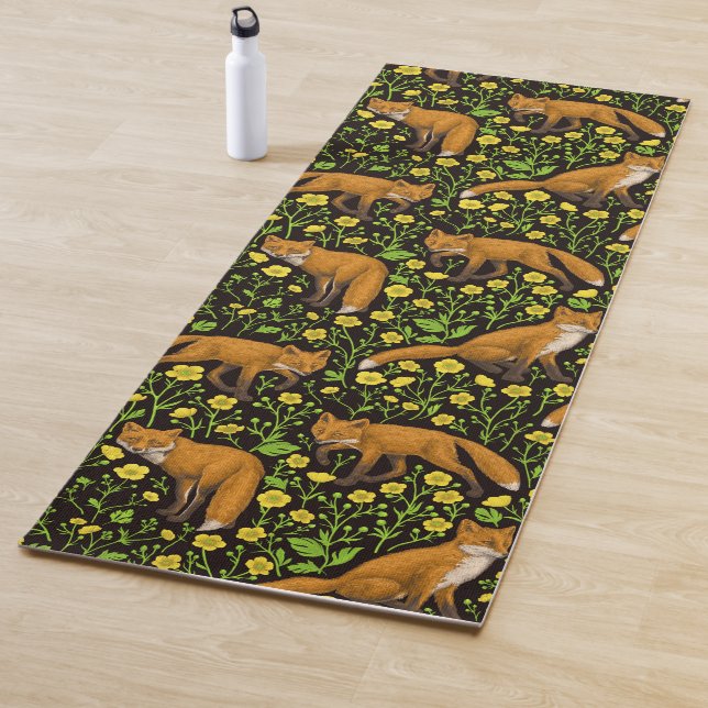 Foxes and buttercups on black yoga mat (In Situ)