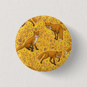 Foxes and buttercups on orange 3 cm round badge
