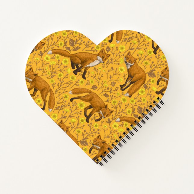 Foxes and buttercups on orange notebook (Back)