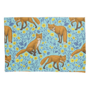 Foxes and buttercups on pool blue pillowcase