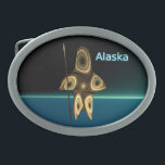 Fractal Inuit Hunter Oval Belt Buckle<br><div class="desc">A brown-toned fractal image suggesting a highly-stylised Inuit hunter,  wearing traditional fur clothing,  holding a harpoon with an ivory head. The image is superimposed on a background depicting the dark polar winter.  Text reading "Alaska" appears in glowing blue and white.</div>